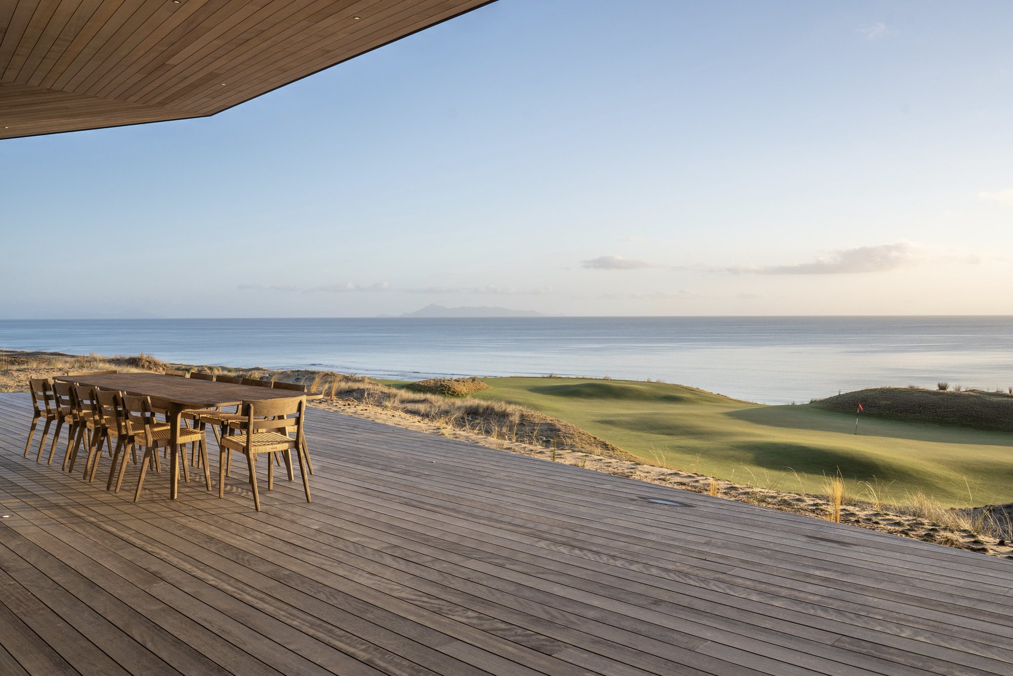 Dining table on the deck overlooking the fairway